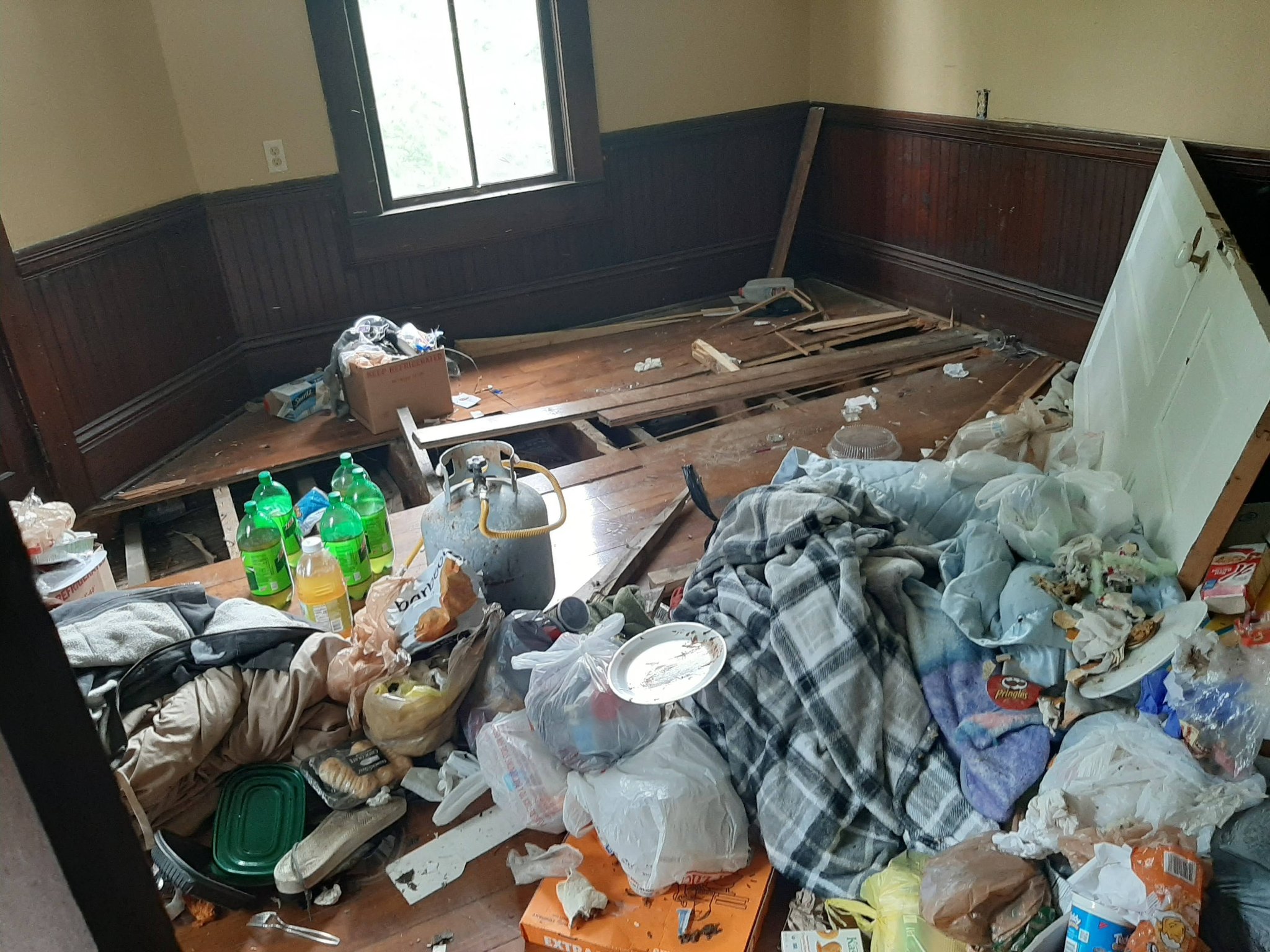 Room interior — abandoned belongings