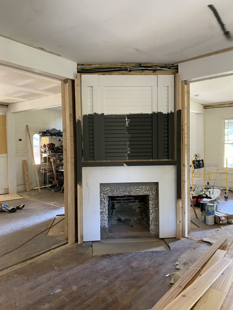 Original fireplace — framing & paint samples during interior renovation