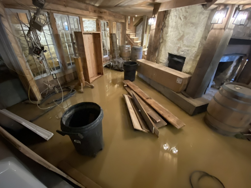 Wine Cellar flood — a torrential storm during construction left 8 inches of water in the cellar